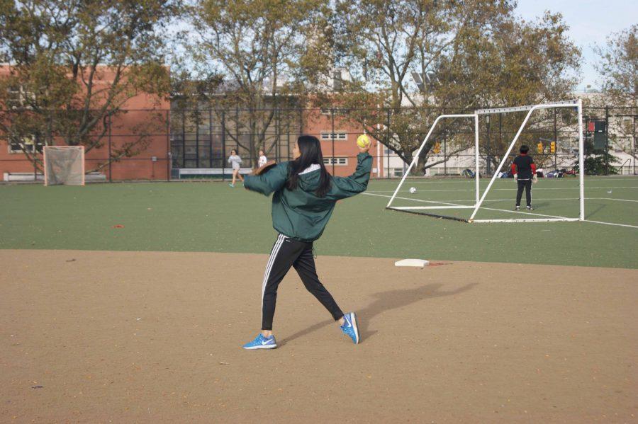 Anna Leidner ‘18 throws a softball during a preseason practice with the Girls Varsity Softball team.
