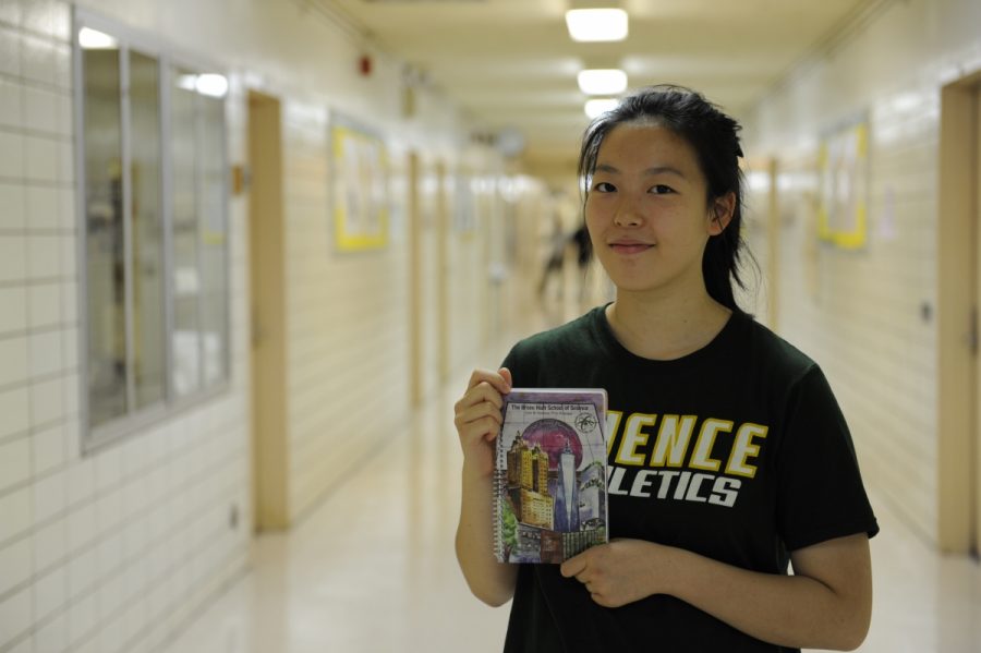 Valerie Dou ’19, with her winning planner design for 2017-2018.