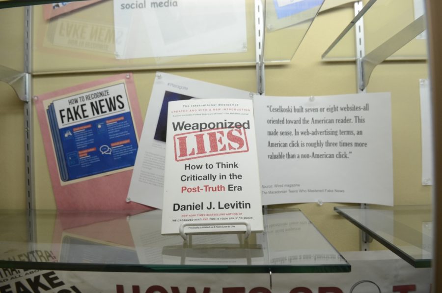 A book in the Fake News display in front of the Bronx Science school library.