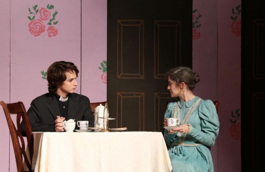 Reverend Harper, played by Joseph West ’18, chats with Abby Brewster, played Caroline Gallagher ’19 about the reverend’s daughter and Abby’s nephew, Mortimer, over tea. 
