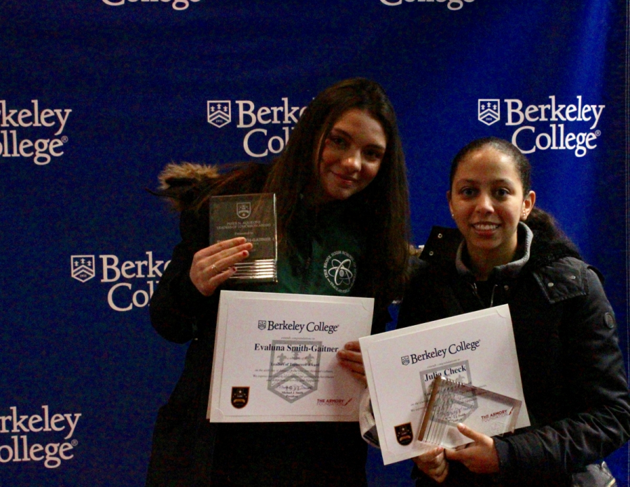 Evaluna Smithgartner ’20 (left) and Julia Check ’21 (right) proudly hold up their awards.