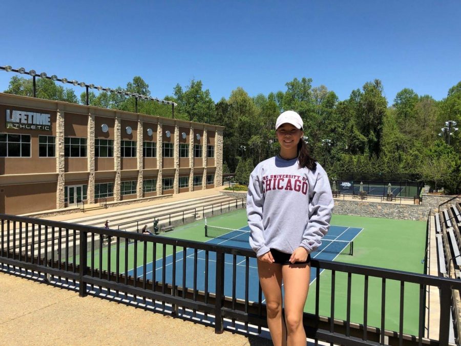 Perene Wang ’19 posing in front of the University of Chicago Tennis Court.
Courtesy of Perene Wang ’19
