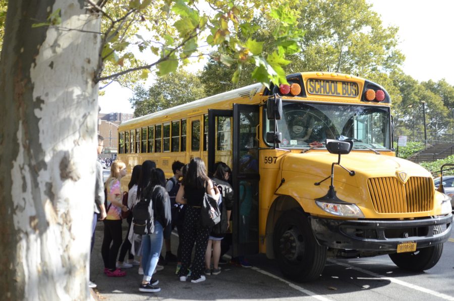 Students board a Vallo bus, a main mode of transportation to and from Bronx Science. Many students take Vallo because without it, their commutes would cut further into their already sleepless schedules. 