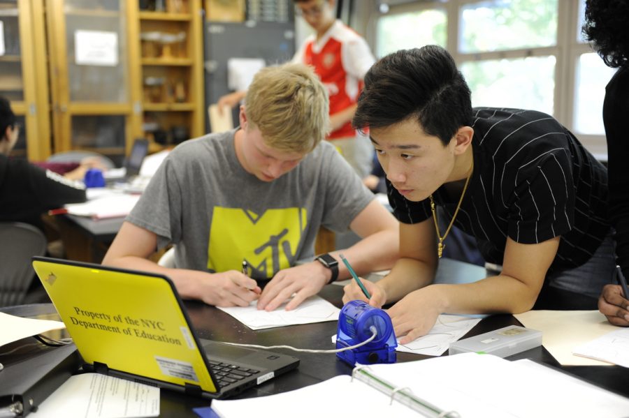 Kyle Catry ’20 (left) works diligently with his partners on an A.P. Physics lab assignment, which will help to prepare him for both the Advanced Placement exam and the Regents exam in this subject area.

