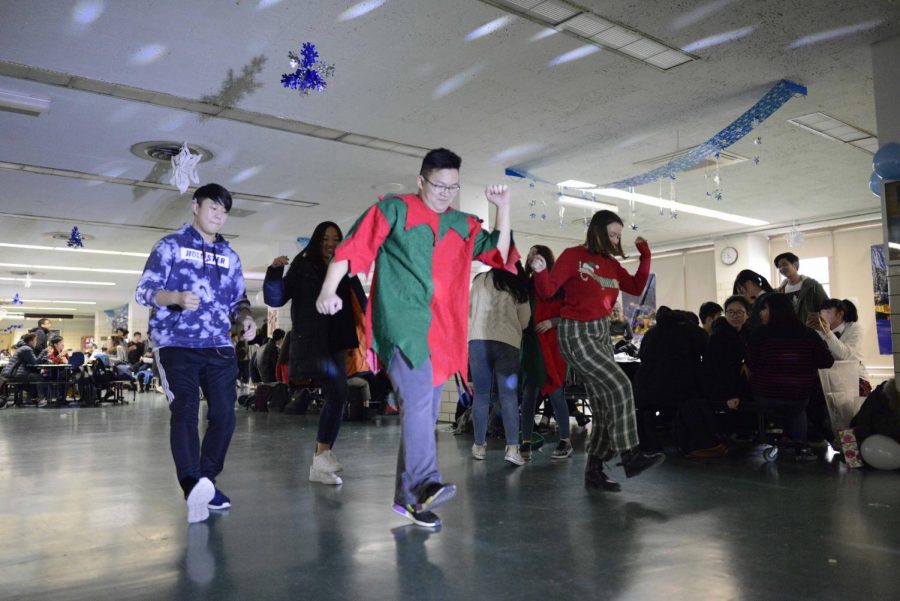  Students get on the dance floor and perform a dance routine during the Winter Wonderland festivities.