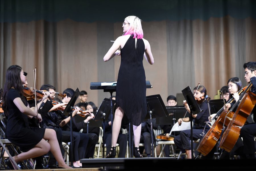 “I think of conducting as being the vessel through which the orchestra understands the music. To me, it just seemed like a more in-depth way to appreciate the music I had already devoted myself to,” said Amelia Krinke ‘23, who arranged and conducted a piece for the Orchestra.