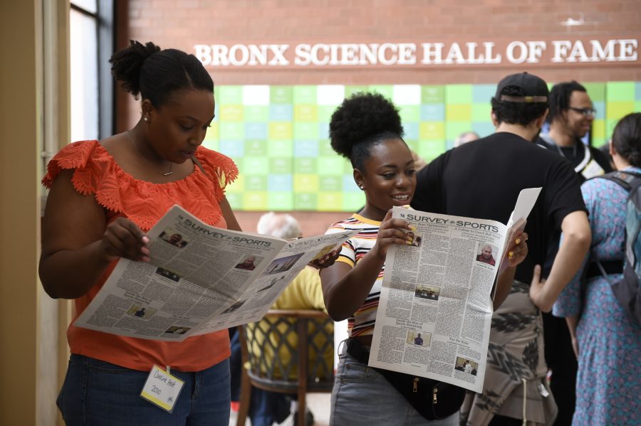 Caroline Holt ’10 and Katherina Brown ’10 read the latest issue of The Science Survey during Alumni Day on June 2nd, 2019.