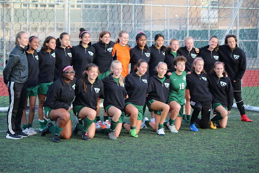 Bronx Science Girls Varsity Soccer team posing for a team photo after one of their many practices.