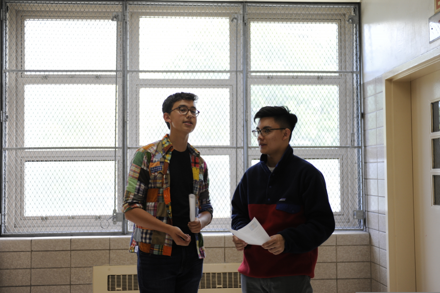 Jonathan Bar-On ’20 and Garreth Hui ’20 discussing the current famine in North Korea and potential resolutions.