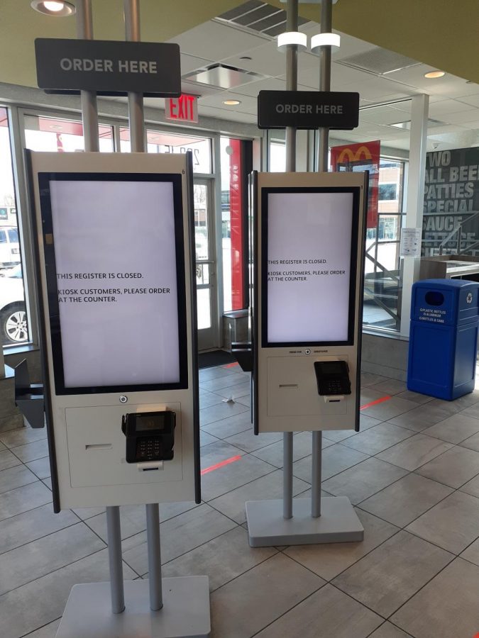 Normally bustling with activity, a McDonald’s restaurant is forced to adhere to social distancing guidelines, shutting down its kiosks for the foreseeable future.  
