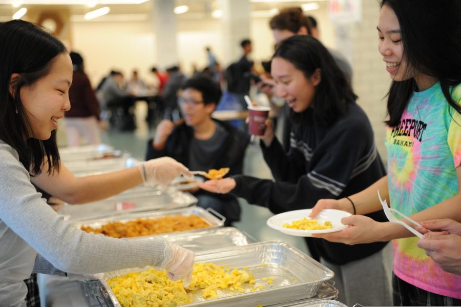 Seniors enjoy interacting with friends while trying an assortment of dishes during their Senior Brunch.