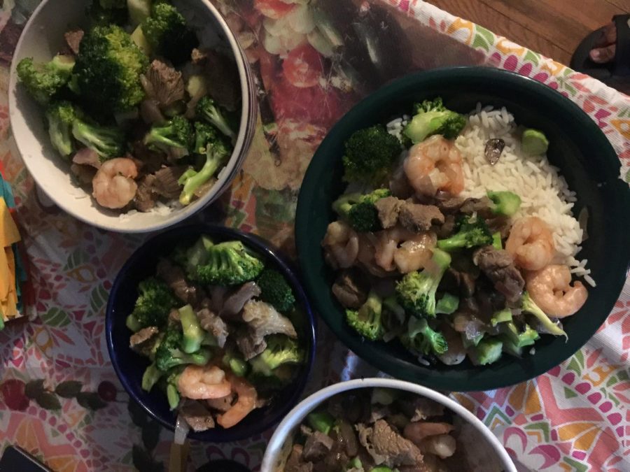 In her broccoli stir-fry over rice, the darker taste of the beef is balanced out by the lighter taste of the shrimp, said Juliet Daniel 21.