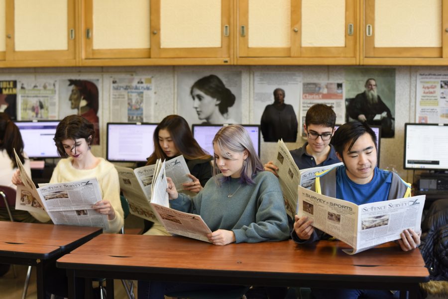 The importance of freedom of the press in a democracy cannot be emphasized enough, as the students in Bronx Sciences Journalism class know well. Here, the editors of The Science Survey newspaper proof the latest issue of the print edition. 