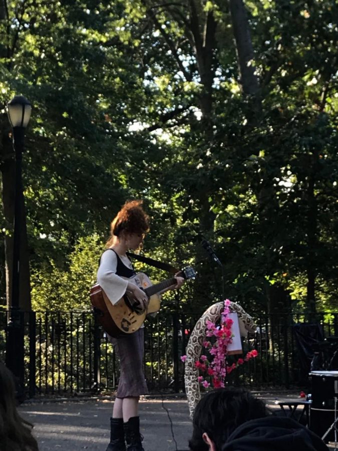 Clara Joy plays a socially-distanced concert in Tompkins Square Park.
