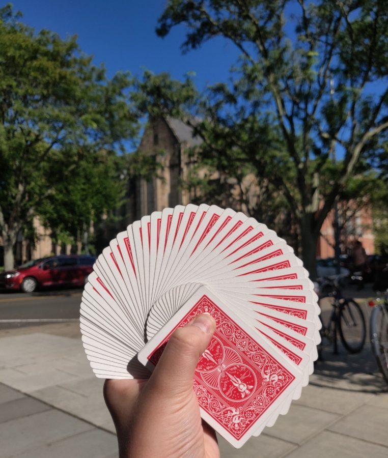 This is a thumb fan display of cards, taken near the Beinecke Rare Book & Manuscript Library in New Haven, Connecticut, which holds the Cary Collection of Playing Cards.