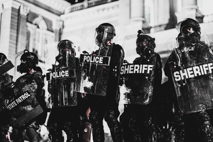 Police lined up in riot gear during the January 6th, 2021 Capitol riot.