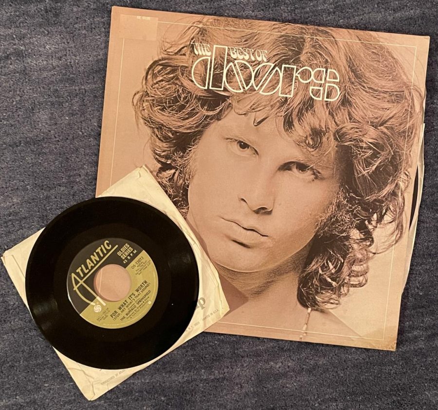 The author is particularly proud of this original 1973 pressing of The Best of The Doors which she purchased while walking down Columbus Avenue, and this Buffalo Springfield 45 pressing of their hit song For What Its Worth.