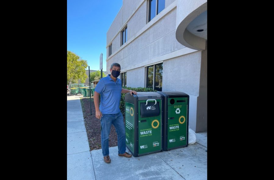 Gruson stands next to BigBelly waste and recycling units. Although recycling is useful, recyclable does not mean impact-less, he warns, as is still a form of disposal. Consuming less and repairing are better alternatives — thats why reduce and reuse come before recycle in the three Rs.