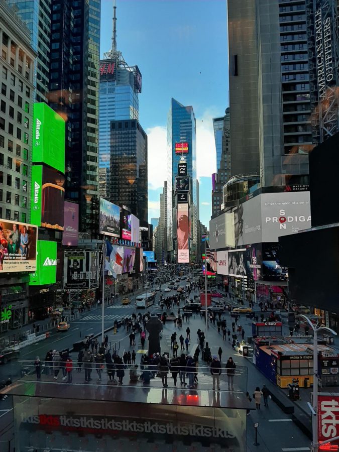 People crowd around Times Square in early 2020, before the Coronavirus pandemic began. Fossil fuels are seen as an essential part of maintaining the facilities in our fast-paced New York City.