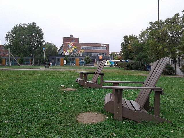 Two chairs set up on a campus green
