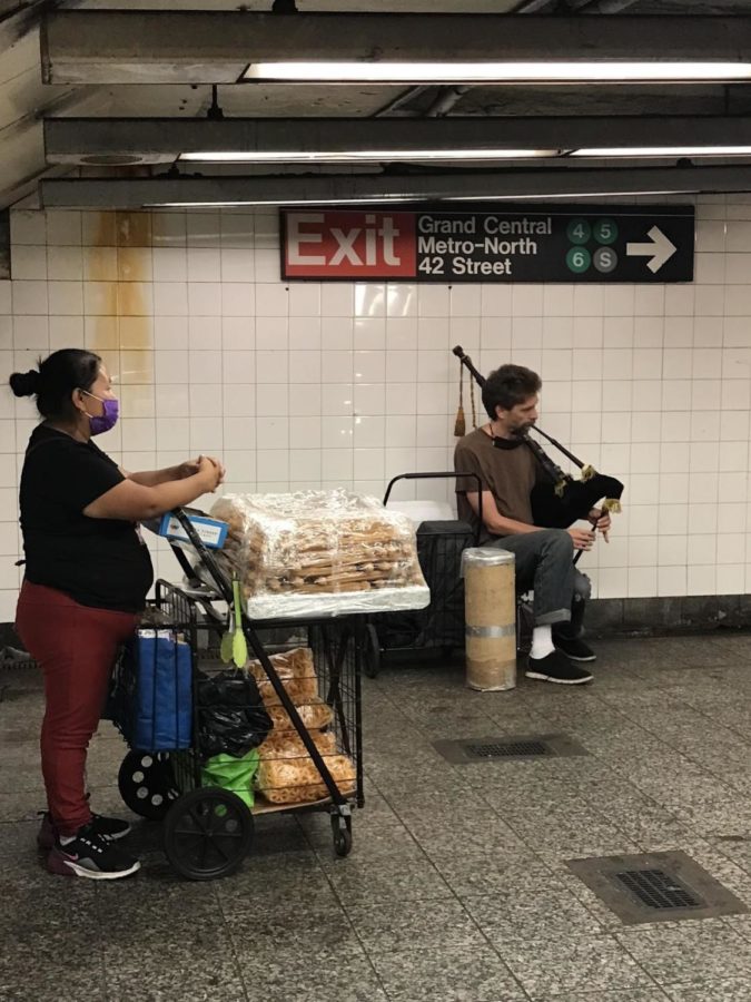 Students who transfer at Grand Central Station most likely have heard music from this performer and his bag-pipe like instrument.