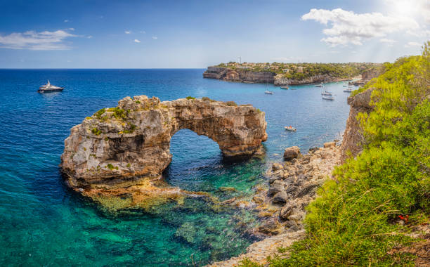 Es Pontàs (The big bridge) is a natural arch in the southeastern part of the island of Mallorca. The arch is located on the coastline between the Cala Santanyí and Cala Llombards in the municipality of Santanyí.