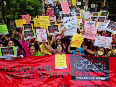 Nazma Akter and other Bengali workers protest for an end to job insecurity.