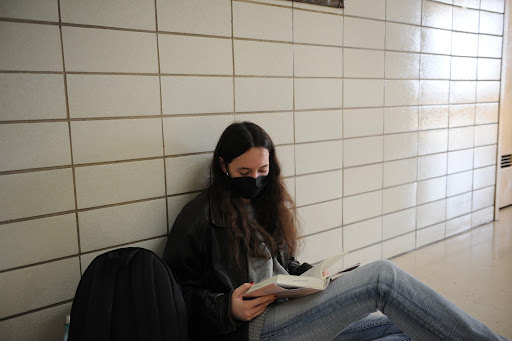 Reading works from diverse authors resonates with Bronx Science students and teachers. Here, Genevieve Morange ‘22 is reading The Idiot, a semi-autobiographical novel by Turkish-American author Elif Batuman. Selin, the main character, is a linguistics student at Harvard who struggles to fathom adulthood, the world, and her own identity.