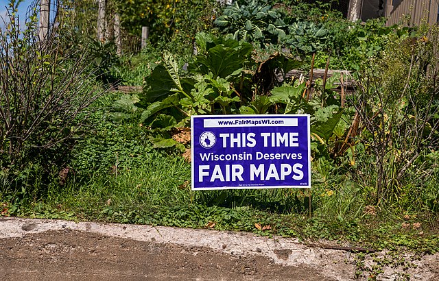 Here is a yard sign with a message advocating change with gerrymandering laws in Wisconsin. 