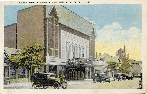 A postcard of Austin Street in ‘Old Forest Hills.’ The small shops that once existed on Austin Street have been replaced by bigger corporations and restaurants. 