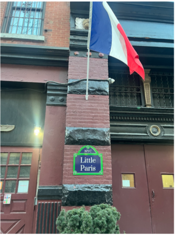 A Little Paris sign, along with the French Flag, mark the official French quarters of New York City. It can be found on Centre Street in Soho. 