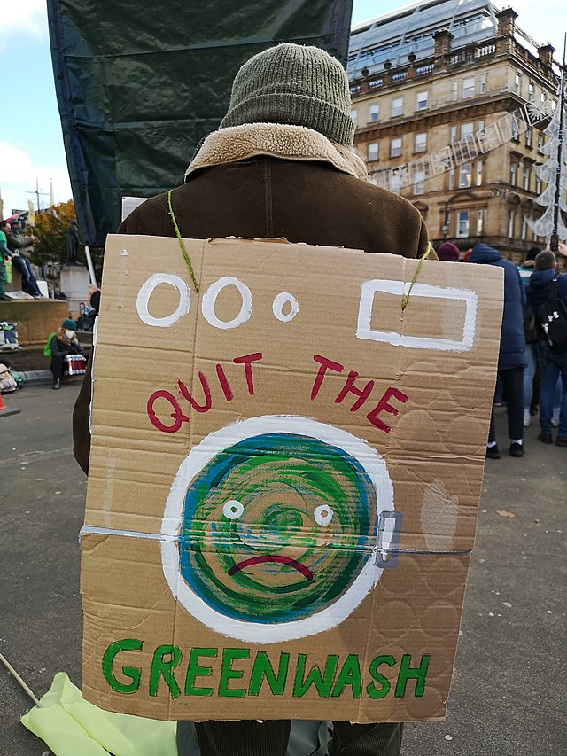 In+2021%2C+protesters+lined+up+outside+the+COP26+Climate+summit+in+Glasgow+to+advocate+for+more+strict+guidelines+and+regulation+on+large+corporations%2C+in+order+to+limit+greenwashing.