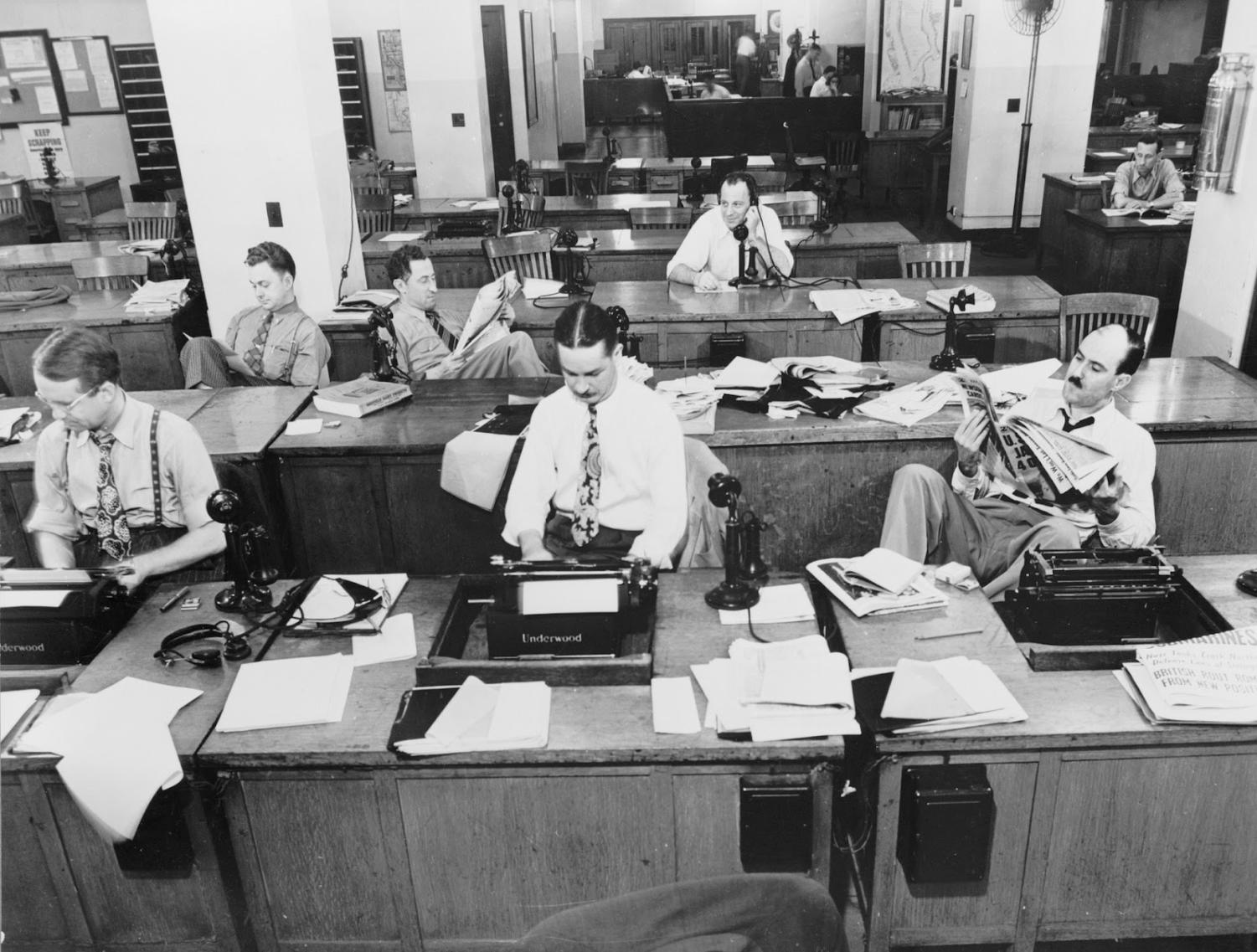 1942 - Journalists for the New York Times work and read the newspaper. Eighty years later, journalism has changed radically and, as new technologies continue to emerge, it is almost guaranteed journalism will continue to change.