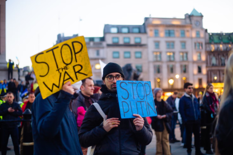 Protesters against the war in Ukraine march in London, England. 