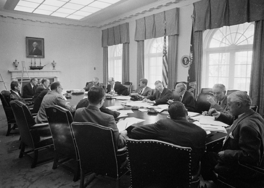 President John F. Kennedy meets with members of the Executive Committee of the National Security Council (EXCOMM) regarding the crisis in Cuba in October 1962, during an era regarded as a golden age of U.S. strength and international relationships. 
