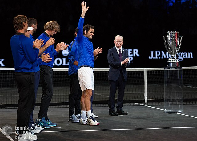 After winning the inaugural Laver Cup in 2017, Federer graciously accepts the trophy. In 2022, he would retire at that very same event, alongside rivals and friends.