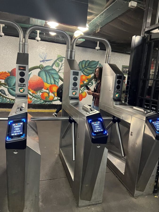 Commuters can now pay their fares by tapping on OMNY readers, as seen at the Number 4 train Bedford Park Boulevard Station near Bronx Science. 
