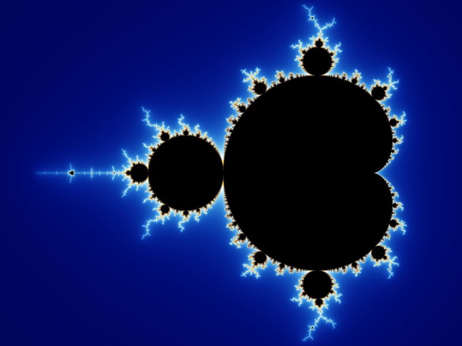 Zooming out you will find the famous shape of the Mandelbrot set, which is frequently dubbed the poster child of mathematics. No matter where you zoom into the Mandelbrot set, this shape will reappear infinitely, the only difference being it will be entrenched beneath more complex detail.
