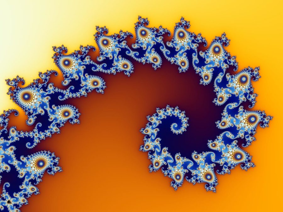 Zooming into a tail of the Mandelbrot set reveals a spiraling structure composed of nebulae-shaped bodies.