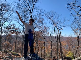 Cross River Reservoir educator Tyler van Fleet points out the different reservoirs, lakes, and ponds that are part of the NYC watershed at the end of our hike.