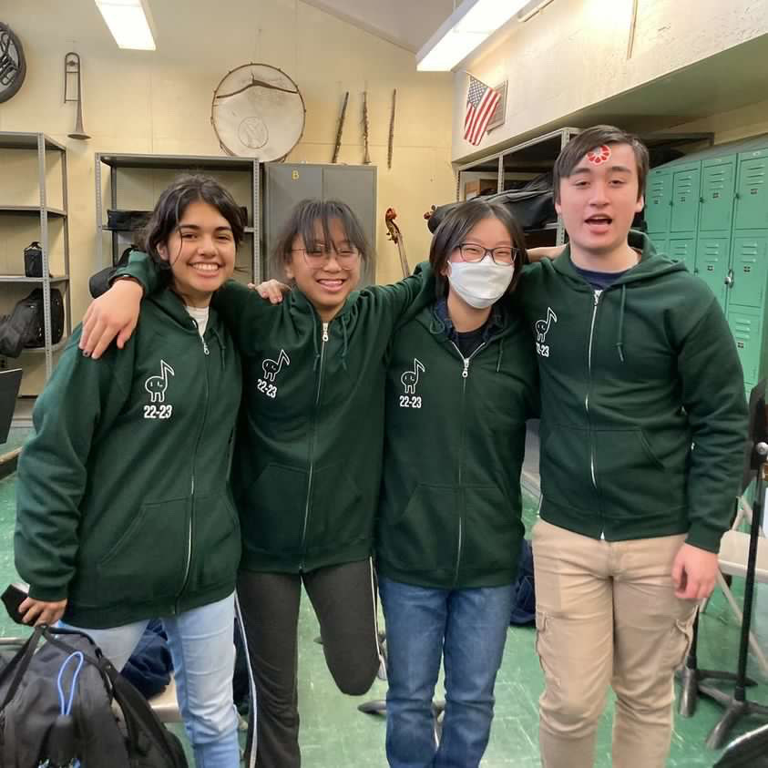 “The community is so unbelievably welcoming and kind, and Im so grateful I found it,” said Kina Nagasaki ’26. Pictured are four out of five members of the small, yet mighty trumpet section of Concert Band. From left to right: Raquel Andon ’24, Kina Nagasaki ’26, Sam Chin ’24, Peter Neggie ’24. 