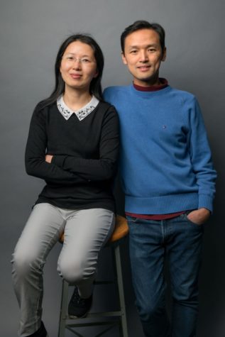 Jie Shan, left, professor of applied and engineering physics in the Cornell College of Engineering, and Kin Fai Mak, assistant professor of physics in the Cornell College of Arts and Sciences, are a married couple of physicists who enjoy collaborating in the lab.