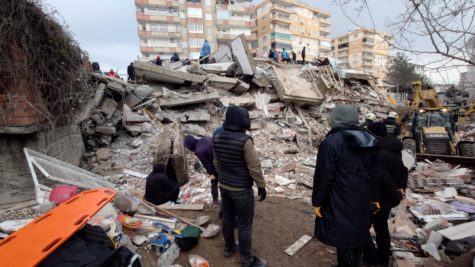 Residents look at the rubble that was once their home in Diyarbakır, Turkey.
