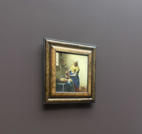 Vermeers The Milkmaid, painted in 1658, is a crown jewel of the retrospective and  one of the first times in his career that Vermeer painted a woman, who is alone, performing a domestic task. This theme became prevalent in his later paintings. 