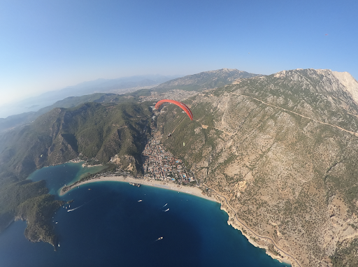 My pilot, surprisingly, trusted me enough to hand me the GoPro in the air. Pictured below are the Ölüdeniz Blue Lagoon, Butterfly Valley, and the city of Fethiye behind the mountains, all in the country of Turkey. 