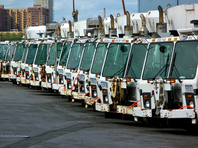 A+fleet+of+garbage+trucks+are+lined+up+in+preparation+to+clean+New+York+City%E2%80%99s+streets.