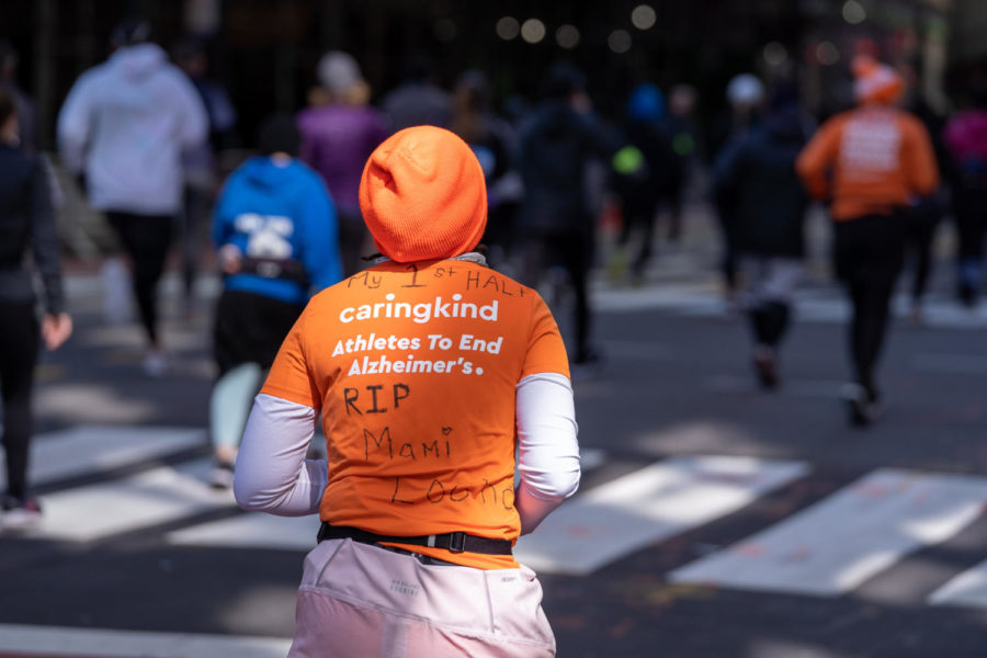 One of CaringKind’s half-marathon runners pays homage to relatives who struggle with dementia as he representis the organization in the NYC Half-Marathon in March 2023. (Photo Credit: Used by permission of CaringKind)