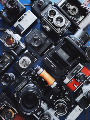  Many photographers have built up their own collection of cameras for their own use and for an appreciation of the engineering feat that is evident in each camera. Photo Credit: Christian Mackie / Unsplash