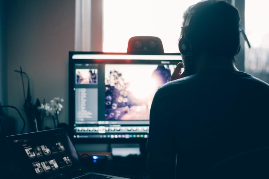 Many people edit photos on their computer using Adobe products. (Photo Credit: Glenn Carstens-Peters / Unsplash)