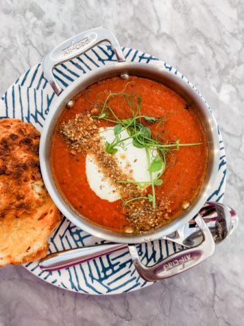 Tomato soup, often paired with a grilled cheese sandwich for a classic rainy-day meal.